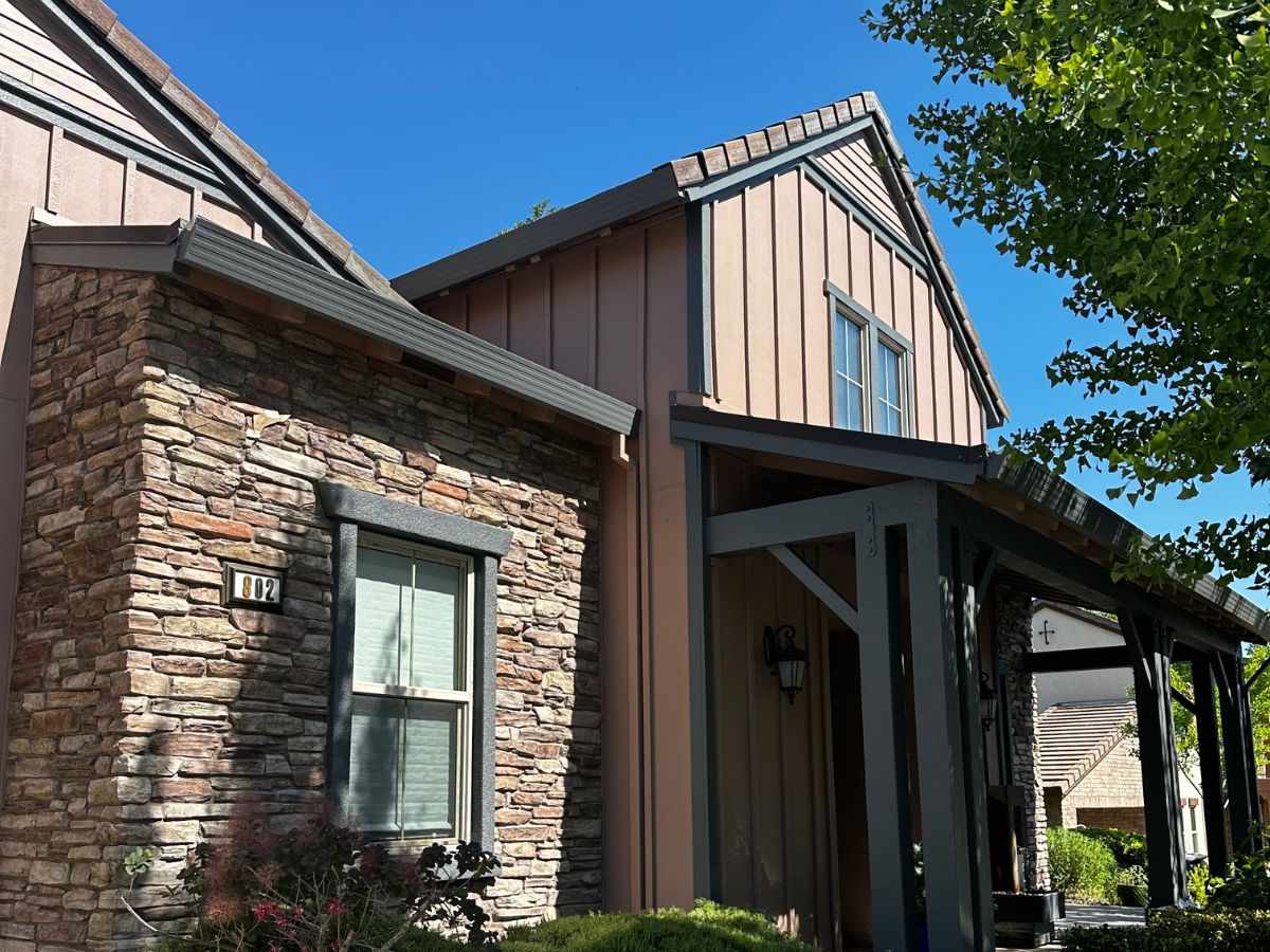Exterior house painting in Rocklin CA with siding and stone accent by Trico Painting